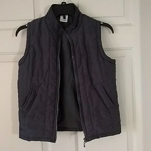 🖐🏽 Purple grey vest